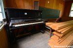 Abandoned Black Piano